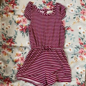 Size 12 romper with stripes.